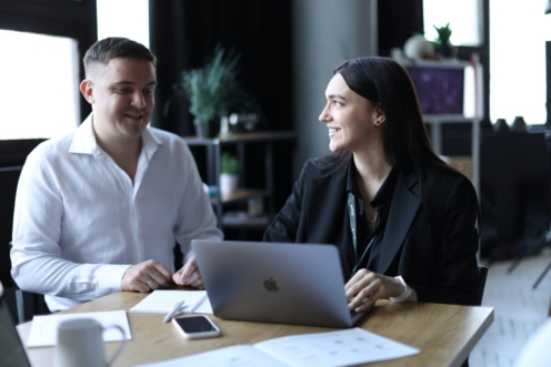 Licensed real estate agent assisting clients with property documents