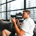 A real estate agent showing an apartment to potential buyers during an in-person viewing