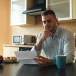 Buyer reviewing electricity bills and energy efficiency before purchasing a property