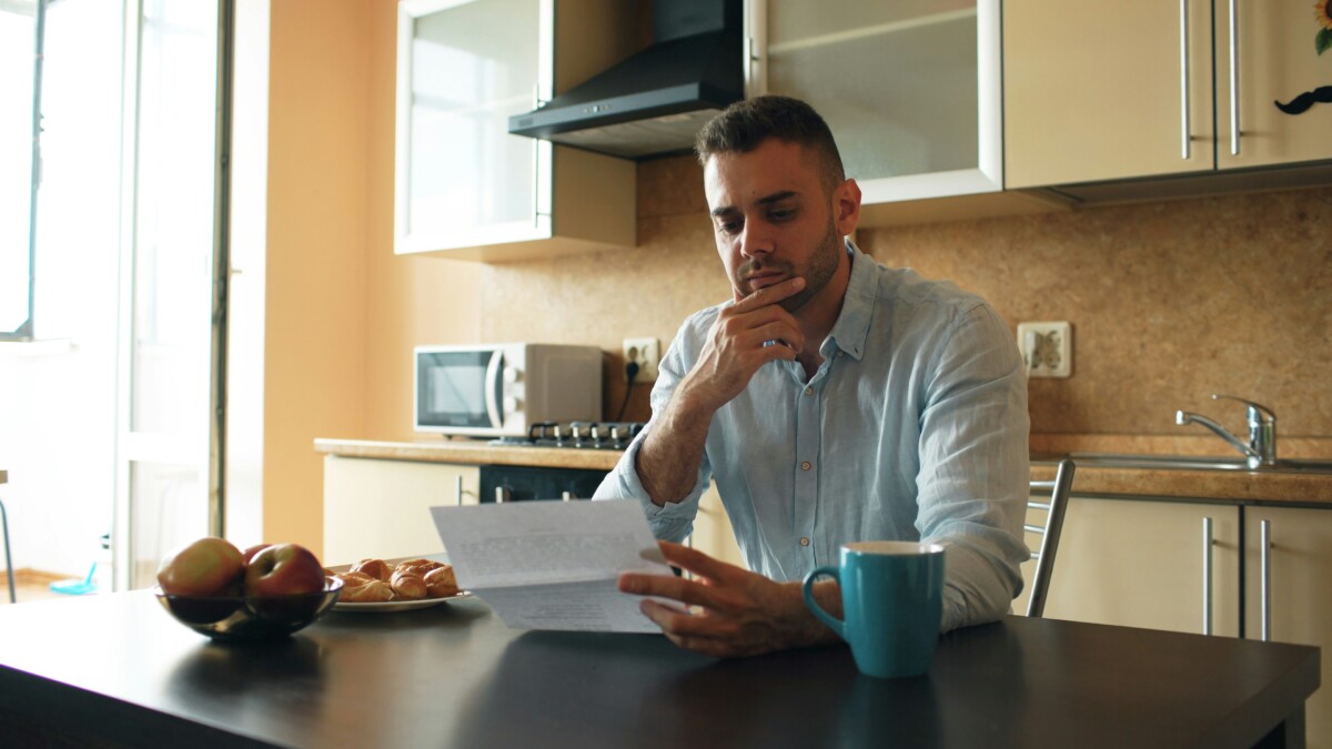 Buyer reviewing electricity bills and energy efficiency before purchasing a property
